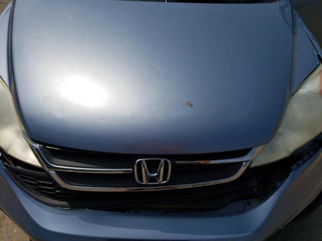 Photo 11 from auction – 2011 HONDA CR-V SE with VIN JHLRE4H40BC008787