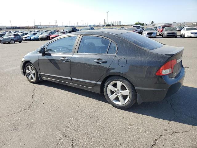 Photo 2 from auction – 2011 HONDA CIVIC LX-S with VIN 19XFA1E6XBE028182