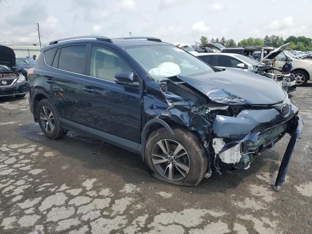 Photo 4 from auction – 2017 TOYOTA RAV4 XLE with VIN JTMRFREV5HJ136323