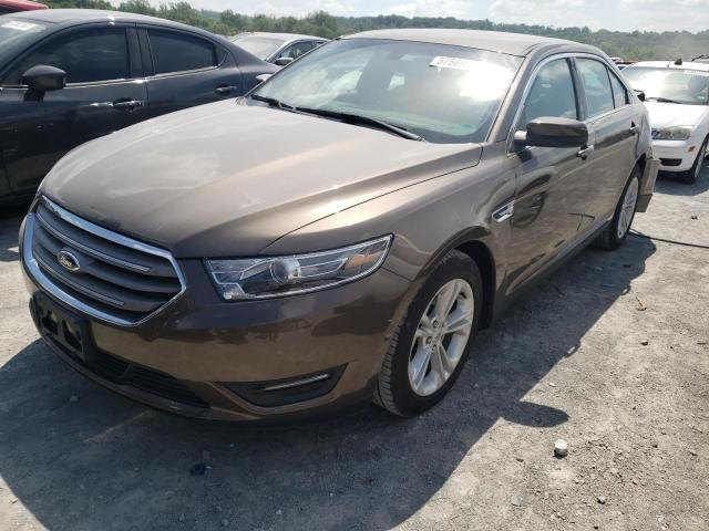 FORD TAURUS SEL 2015 with VIN 1FAHP2E8XFG105739 - Photo from auction