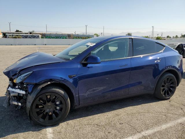 TESLA MODEL Y 2023 with VIN 7SAYGDEE3PA105508 - Photo from auction