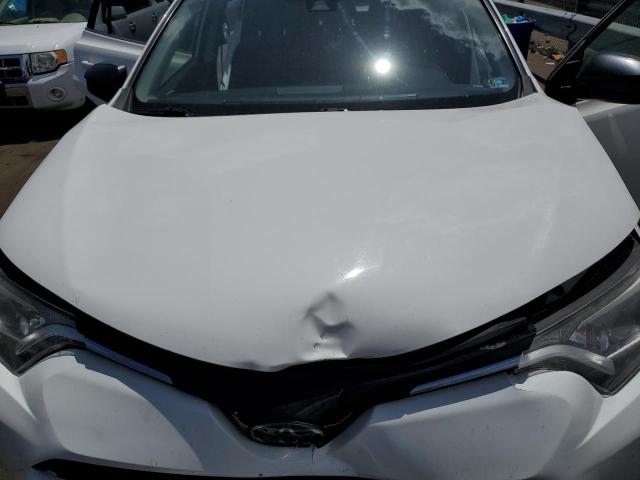 Photo 11 from auction – 2018 TOYOTA RAV4 LE with VIN JTMBFREV2JJ211826