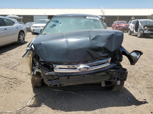 Photo 5 from auction – 2011 FORD FOCUS SE with VIN 1FAHP3FNXBW168754