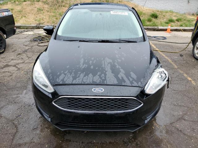 Photo 5 from auction – 2016 FORD FOCUS SE with VIN 1FADP3F24GL257717