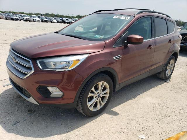 FORD ESCAPE SE 2018 with VIN 1FMCU9GD8JUA17875 - Photo from auction