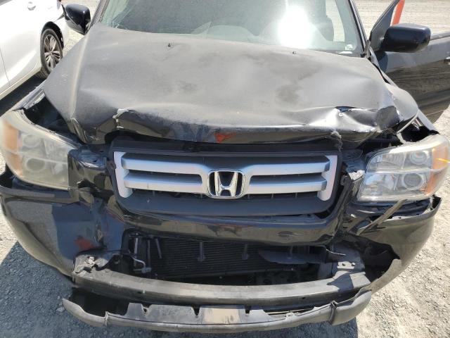 Photo 12 from auction – 2007 HONDA PILOT EXL with VIN 2HKYF18777H526521