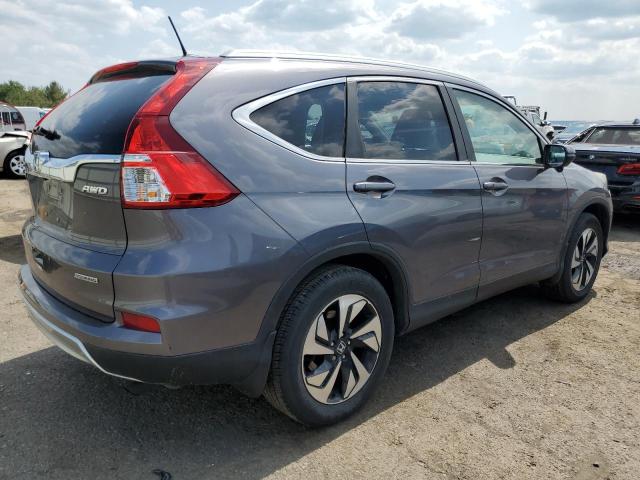 Photo 3 from auction – 2015 HONDA CR-V TOURI with VIN 5J6RM4H91FL069657