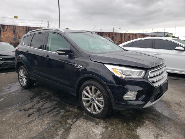 Photo 4 from auction – 2017 FORD ESCAPE TIT with VIN 1FMCU0J98HUB60321