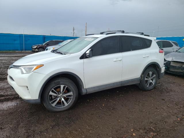 TOYOTA RAV4 XLE 2017 with VIN 2T3RFREV5HW601698 - Photo from auction