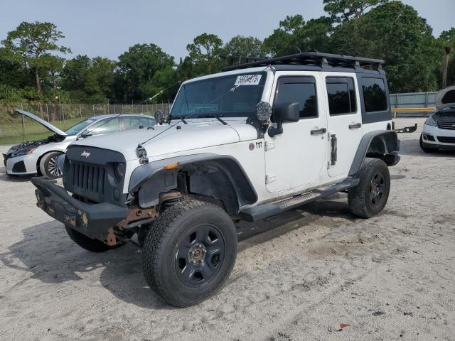 JEEP WRANGLER U 2011 with VIN 1J4BA6H18BL593480 - Photo from auction