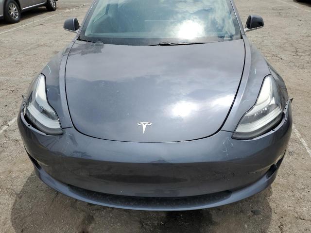 Photo 11 from auction – 2018 TESLA MODEL 3 with VIN 5YJ3E1EA1JF010786