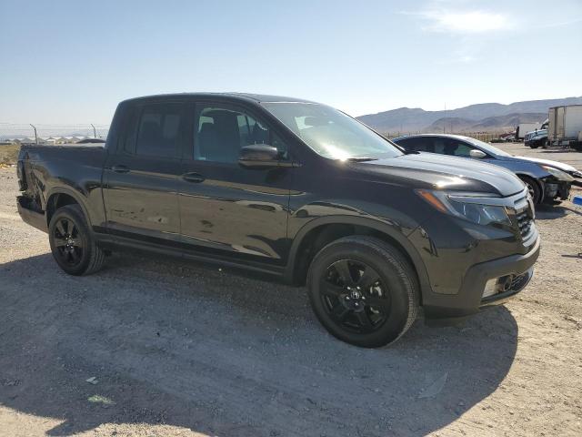 Photo 4 from auction – 2019 HONDA RIDGELINE with VIN 5FPYK3F82KB043536