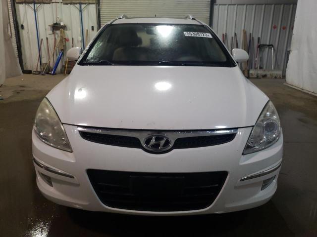Photo 5 from auction – 2012 HYUNDAI ELANTRA TO with VIN KMHDC8AEXCU142544