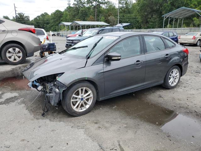 FORD FOCUS SE 2017 with VIN 1FADP3F24HL216909 - Photo from auction