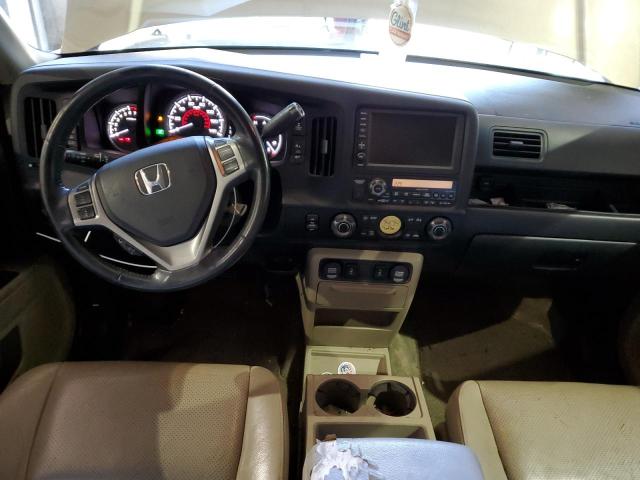 Photo 8 from auction – 2011 HONDA RIDGELINE with VIN 5FPYK1F57BB454795