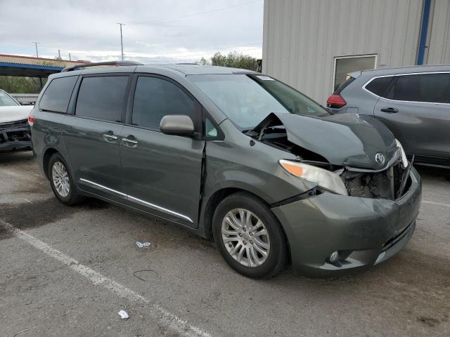 Photo 4 from auction – 2014 TOYOTA SIENNA XLE with VIN 5TDYK3DC1ES458024