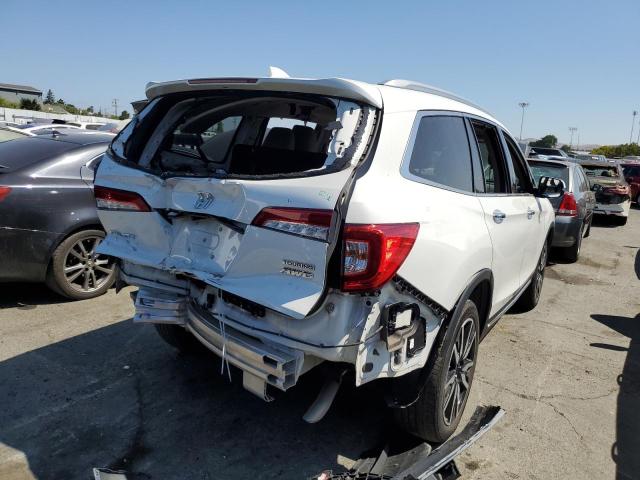 Photo 3 from auction – 2021 HONDA PILOT TOUR with VIN 5FNYF6H93MB015509