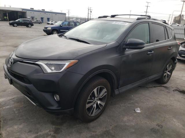 TOYOTA RAV4 XLE 2016 with VIN 2T3WFREV0GW269798 - Photo from auction