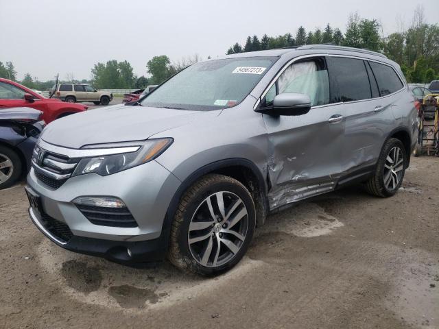 HONDA PILOT ELIT 2018 with VIN 5FNYF6H00JB025475 - Photo from auction