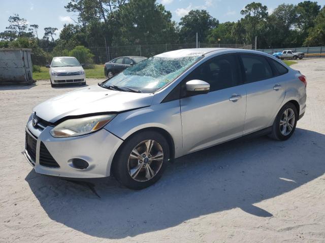 FORD FOCUS SE 2014 with VIN 1FADP3F20EL403303 - Photo from auction