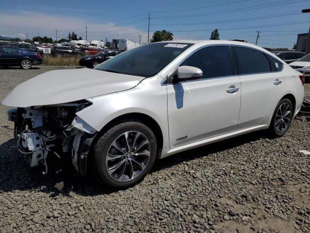 TOYOTA AVALON HYB 2016 with VIN 4T1BD1EB3GU052928 - Photo from auction