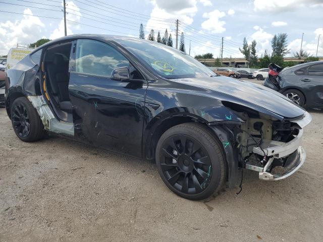 Photo 4 from auction – 2022 TESLA MODEL Y with VIN 7SAYGDEE4NF422598