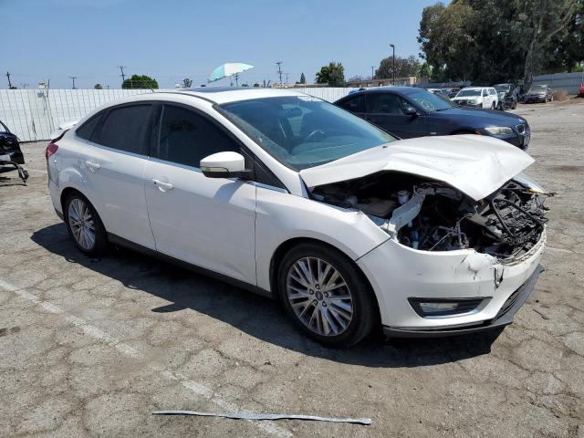 Photo 4 from auction – 2015 FORD FOCUS TITA with VIN 1FADP3J22FL361273