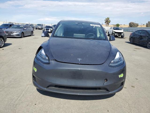 Photo 5 from auction – 2023 TESLA MODEL Y with VIN 7SAYGDEEXPF591429