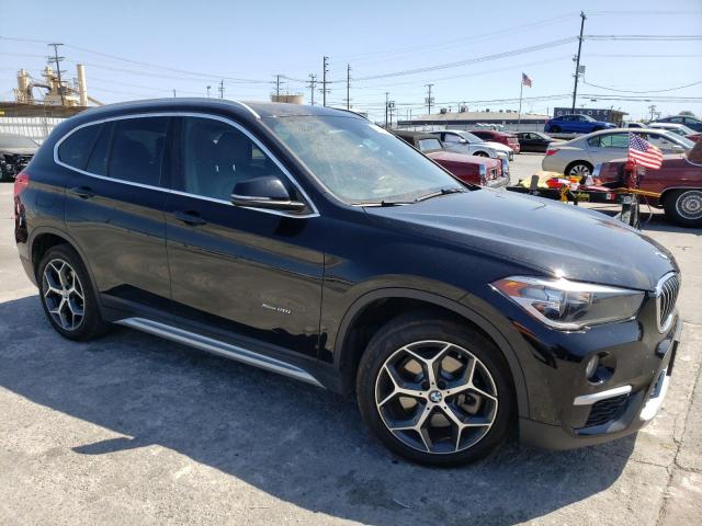 Photo 4 from auction – 2018 BMW X1 XDRIVE2 with VIN WBXHT3C39J5L24542