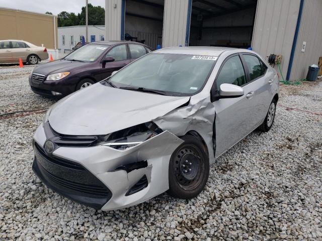 TOYOTA COROLLA L 2017 with VIN 5YFBURHE5HP658304 - Photo from auction