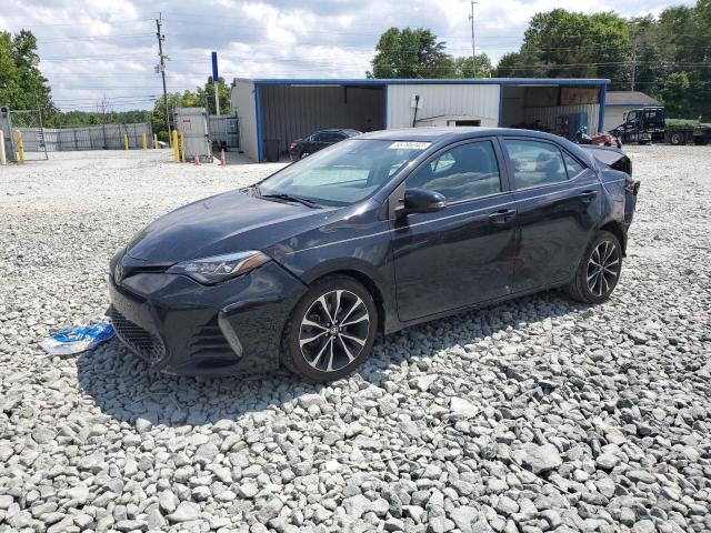 TOYOTA COROLLA L 2017 with VIN 2T1BURHEXHC797411 - Photo from auction