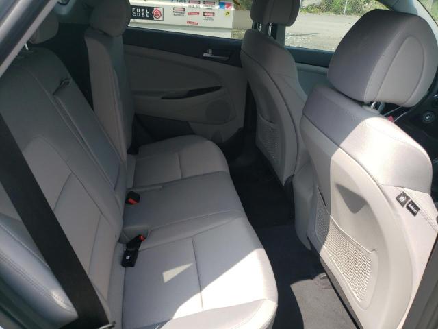 Photo 11 from auction – 2018 HYUNDAI TUCSON SE with VIN KM8J2CA41JU779917