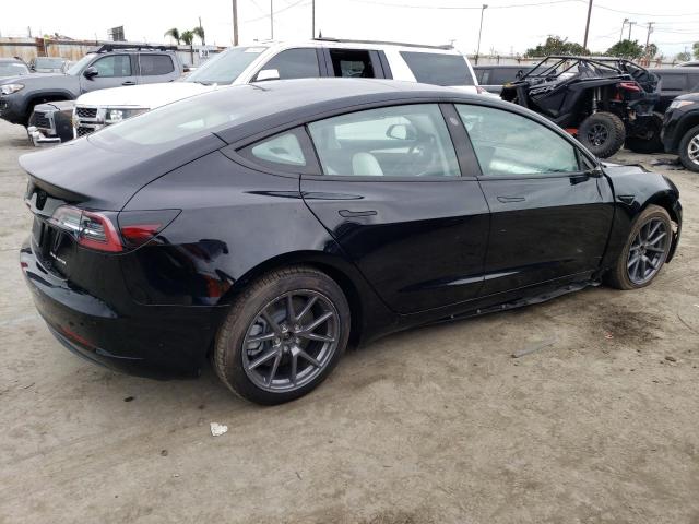 Photo 3 from auction – 2022 TESLA MODEL 3 with VIN 5YJ3E1EB1NF203969