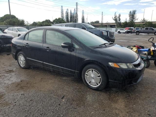 Photo 4 from auction – 2011 HONDA CIVIC HYBR with VIN JHMFA3F29BS001428