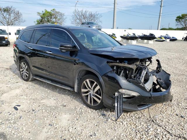 Photo 4 from auction – 2017 HONDA PILOT TOUR with VIN 5FNYF5H96HB002009