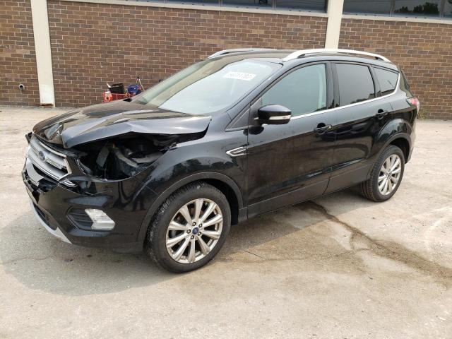 FORD ESCAPE TIT 2017 with VIN 1FMCU0JD4HUA80342 - Photo from auction