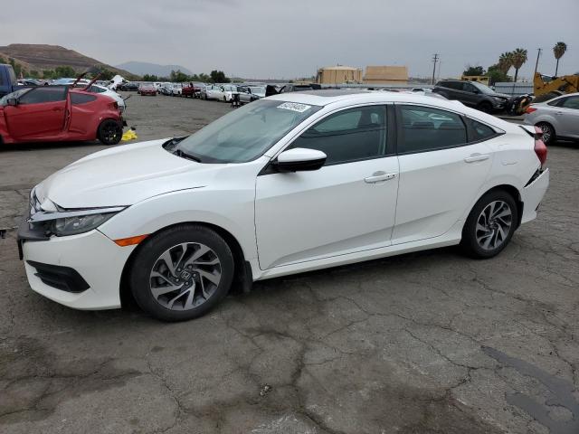 HONDA CIVIC EX 2017 with VIN 2HGFC2F75HH577682 - Photo from auction
