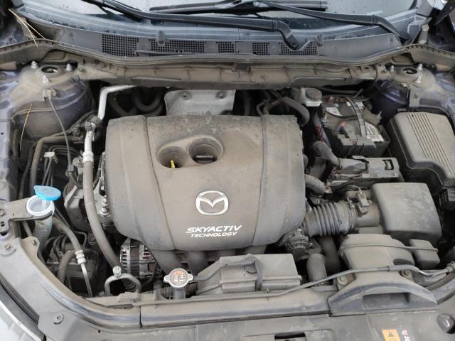 Photo 11 from auction – 2014 MAZDA CX-5 GT with VIN JM3KE4DY3E0304892