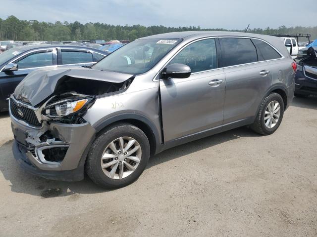 KIA SORENTO LX 2016 with VIN 5XYPG4A31GG057130 - Photo from auction