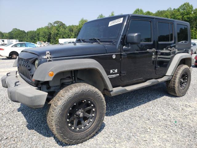 JEEP WRANGLER U 2009 with VIN 1J4GA39149L781734 - Photo from auction