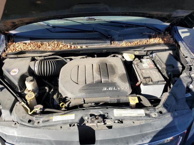 Photo 12 from auction – 2011 VOLKSWAGEN ROUTAN SE with VIN 2V4RW3DG4BR691885
