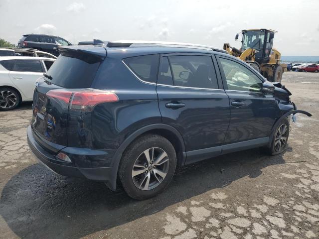 Photo 3 from auction – 2017 TOYOTA RAV4 XLE with VIN JTMRFREV5HJ136323