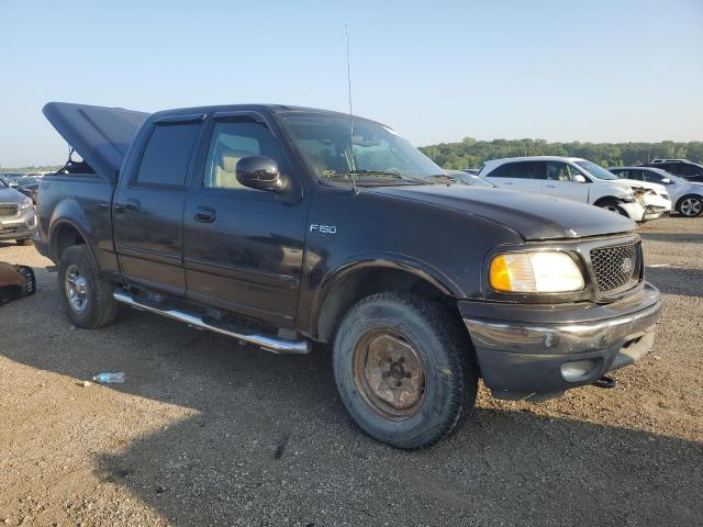 Photo 4 from auction – 2003 FORD F150 SUPER with VIN 1FTRW08L03KB61378