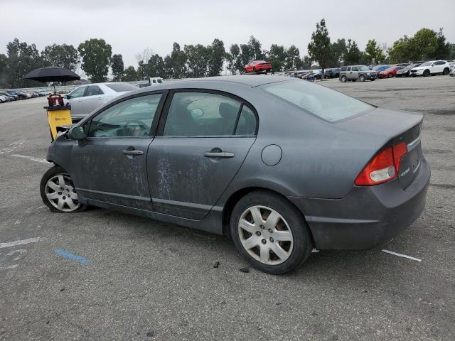 Photo 2 from auction – 2010 HONDA CIVIC LX with VIN 19XFA1F58AE024569