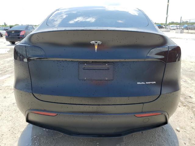 Photo 6 from auction – 2023 TESLA MODEL Y with VIN 7SAYGDEE1PF690561