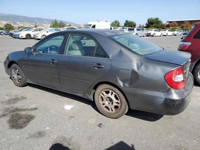 Photo 2 from auction – 2002 TOYOTA CAMRY LE with VIN JTDBE32K220130715