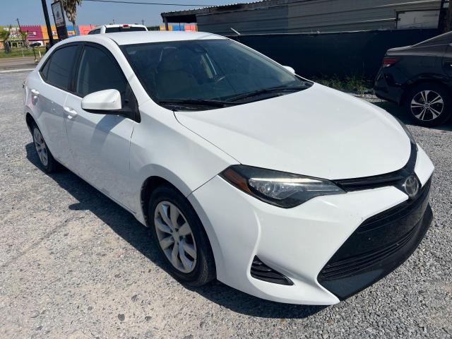 TOYOTA COROLLA L 2017 with VIN 5YFBURHE5HP608082 - Photo from auction