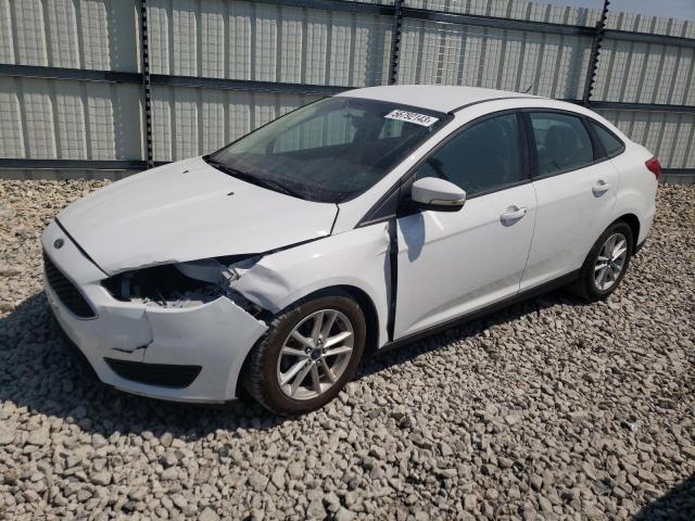 FORD FOCUS SE 2015 with VIN 1FADP3F29FL351123 - Photo from auction