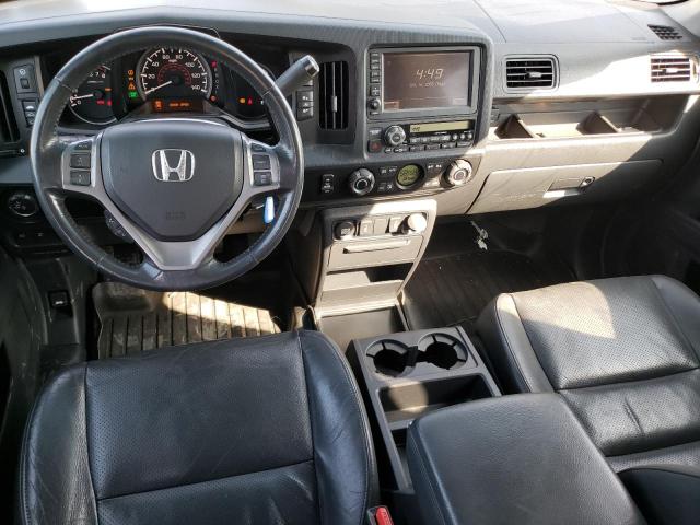 Photo 8 from auction – 2010 HONDA RIDGELINE with VIN 5FPYK1F59AB012745