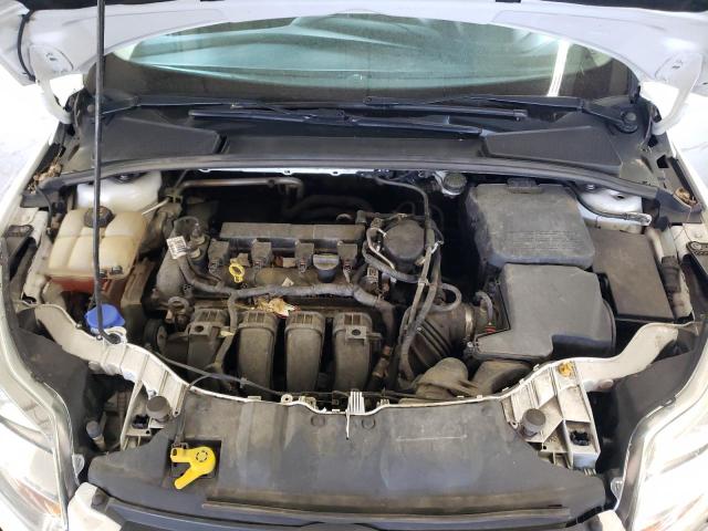 Photo 11 from auction – 2014 FORD FOCUS SE with VIN 1FADP3K21EL338130